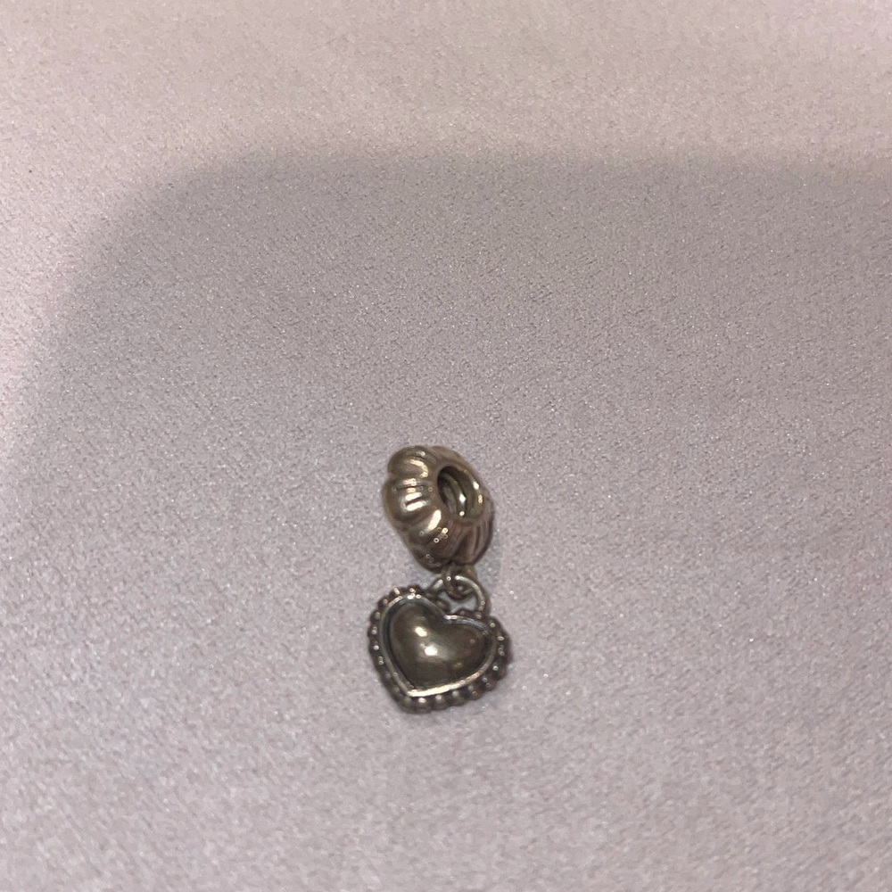 Pandora dangling “Sister” charm